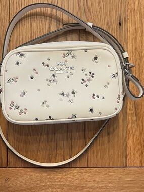 COACH Cream Floral and Star Embellished Crossbody Bag